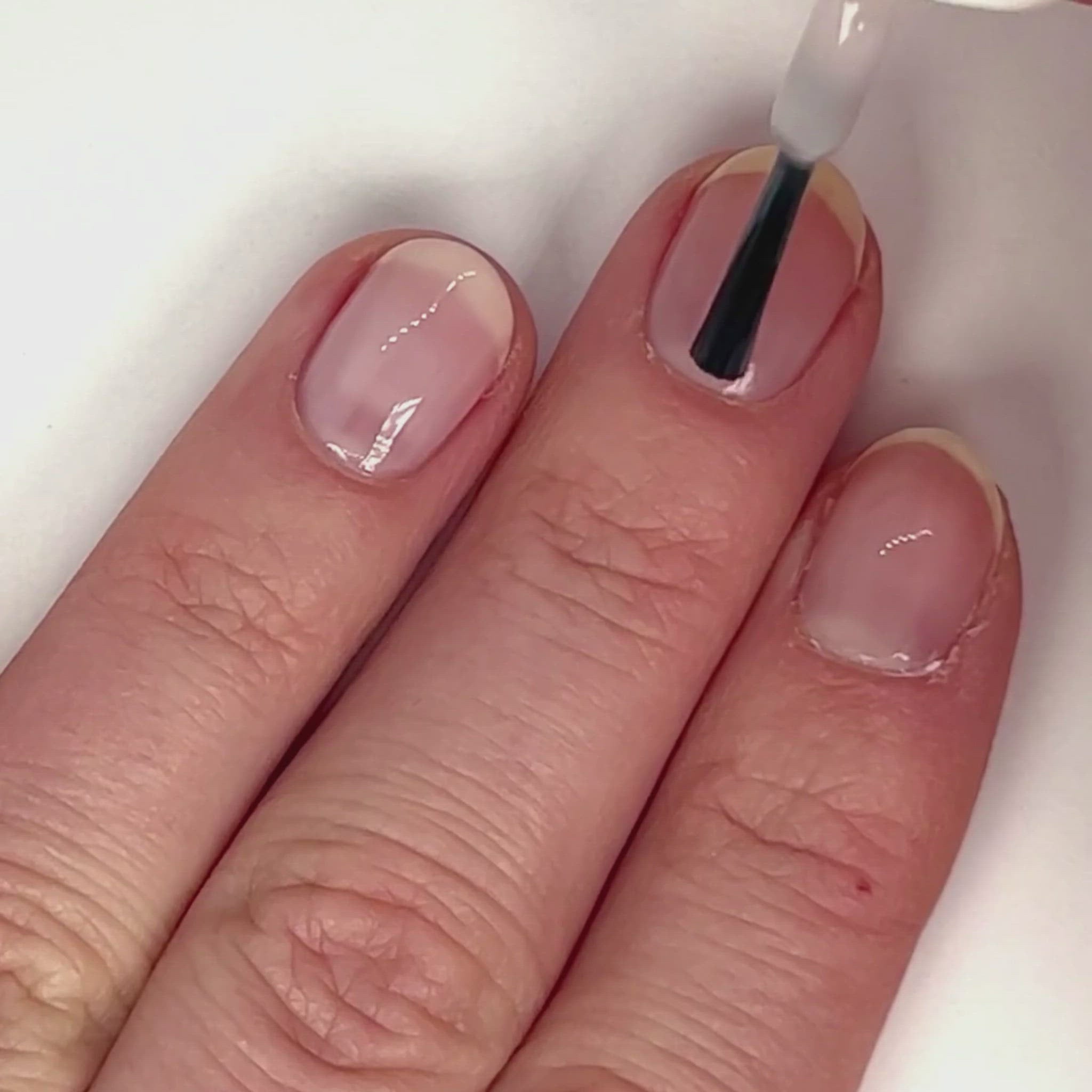 Video of Nails Being Painted with Sheer Pink Polish, Anne